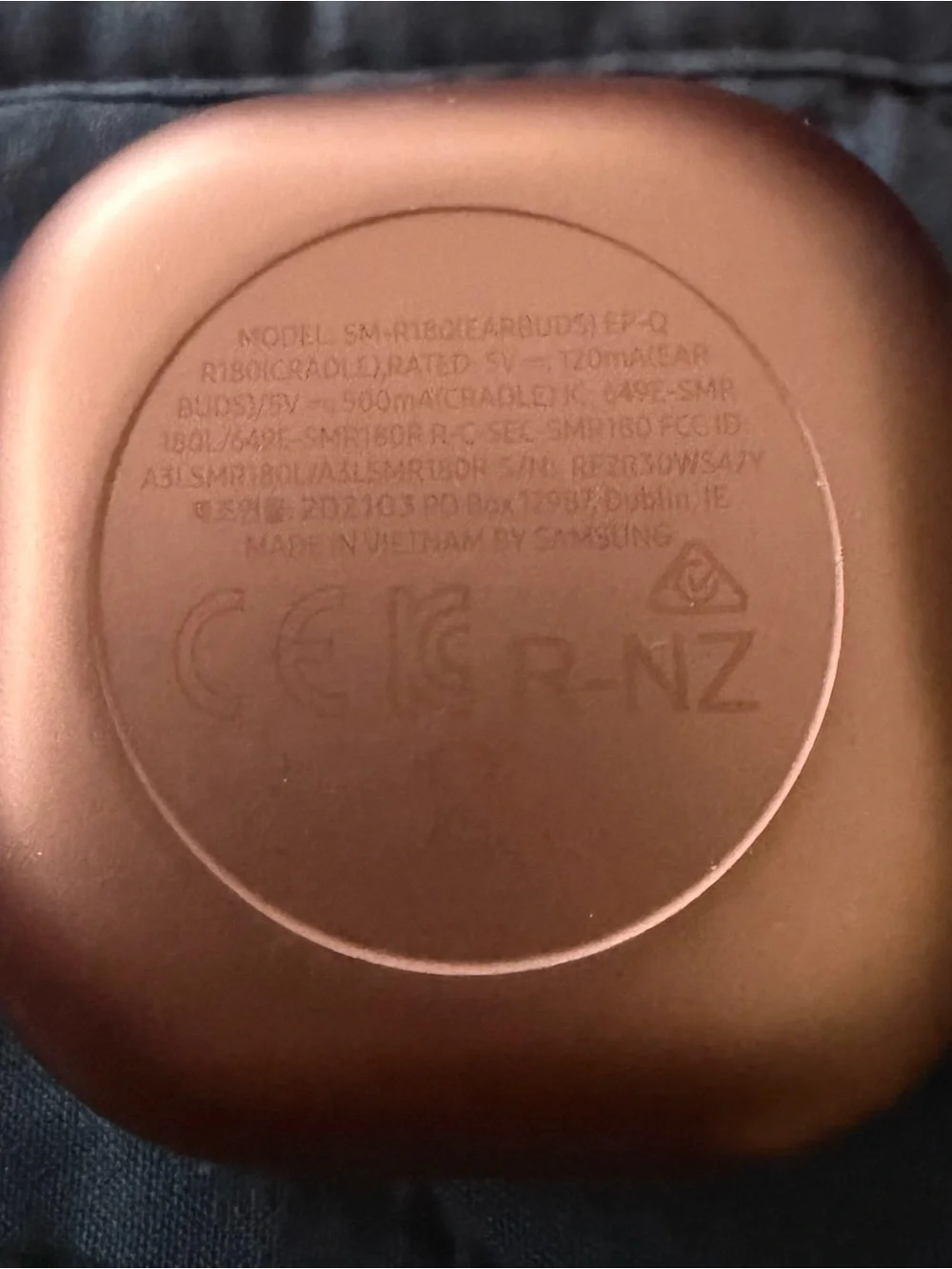 Samsung Earbuds with Charging Case in Rose Copper and Carrying case included.